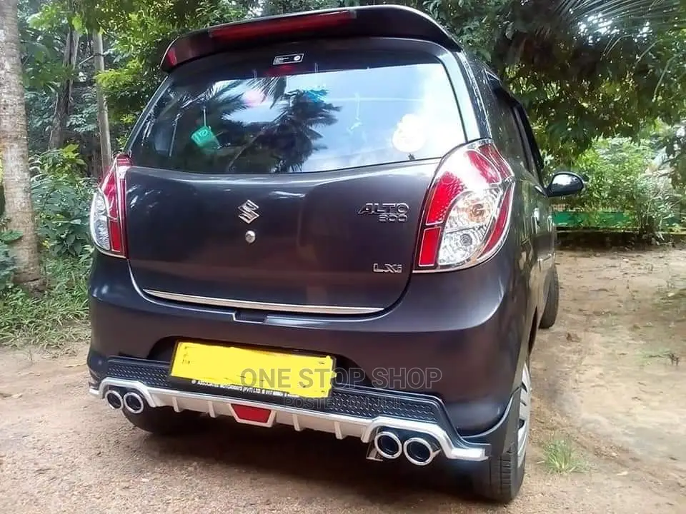 Black Suzuki Alto Car Fitted With Universal Silver Diffuser