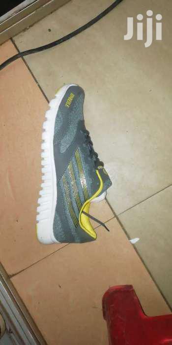 Gym Shoes and Body Work Out