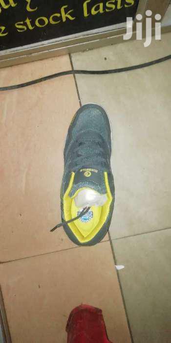 Gym Shoes and Body Work Out
