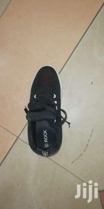 Gym Shoes and Body Work Out