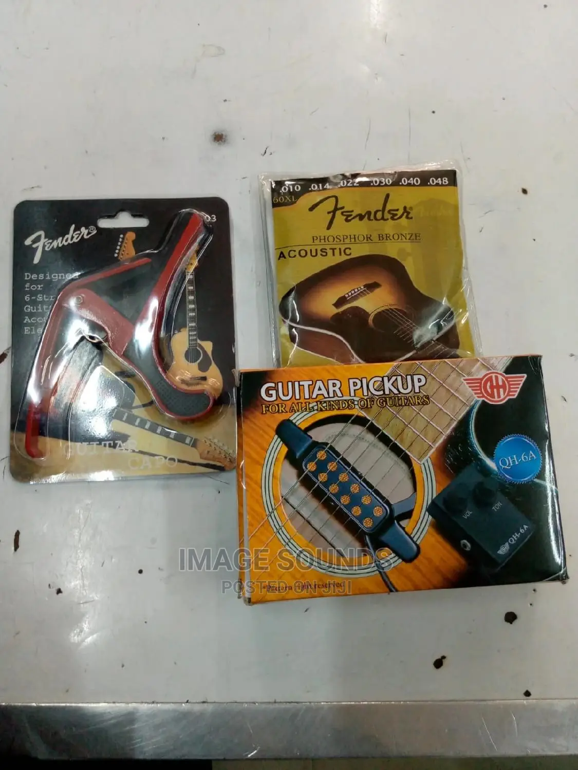 Guitar Capo, With Guitar Pickup and Fender Strings