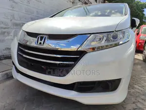 Pearl-Coated 2016 Honda Odyssey: Spacious and Stylish Minivan