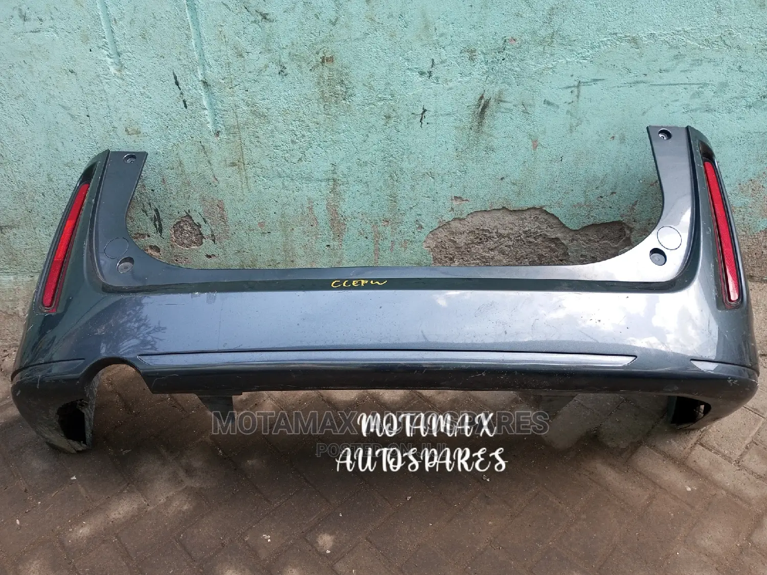 Mazda Biante Rear Bumper Assy.