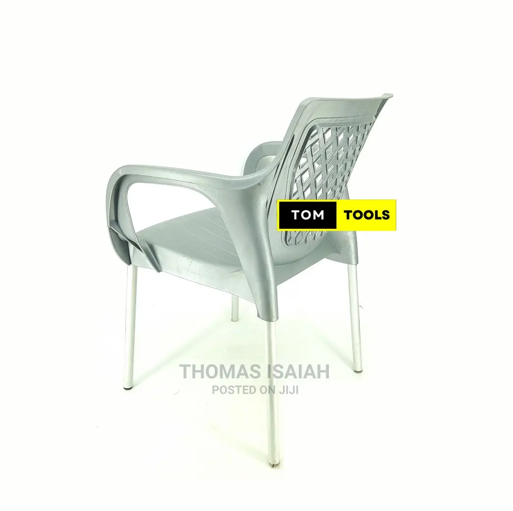 Gray Strong Comfortable Plastic Chair With Metal Tubing Legs