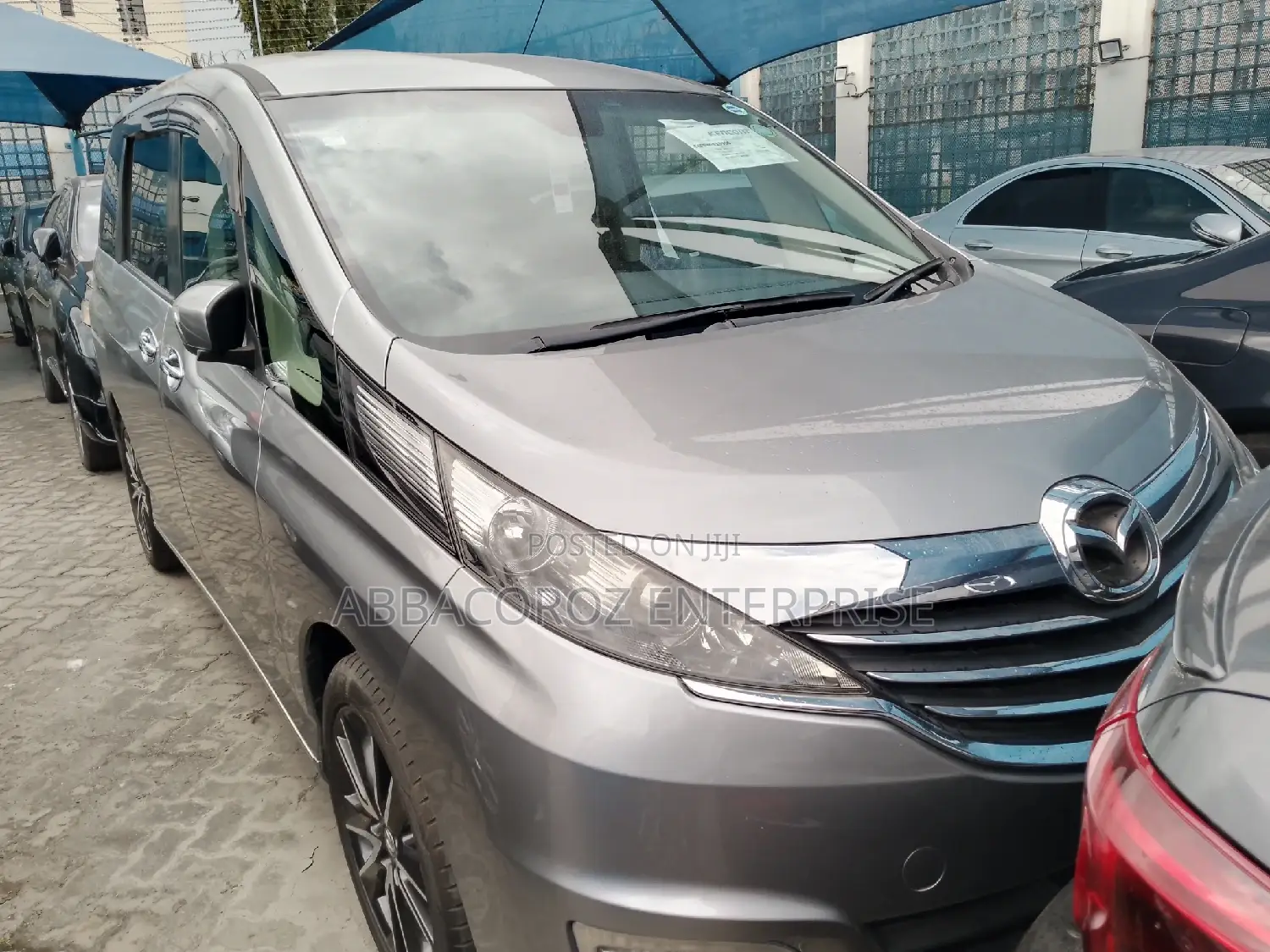 Mazda Biante 2016 Gold