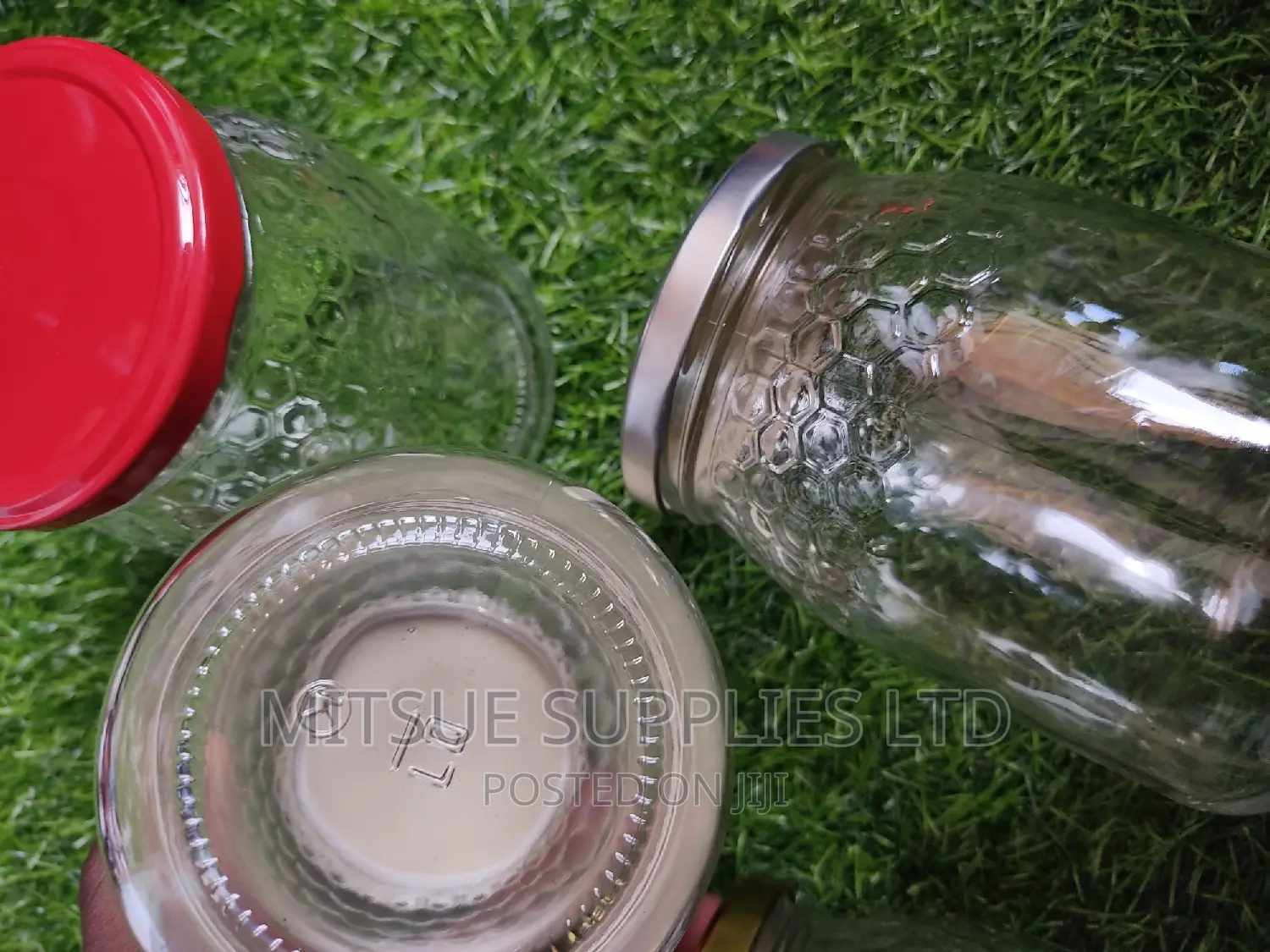 A Set of 40 Glass Jar 740ml With Honey Comb Detail and Lids