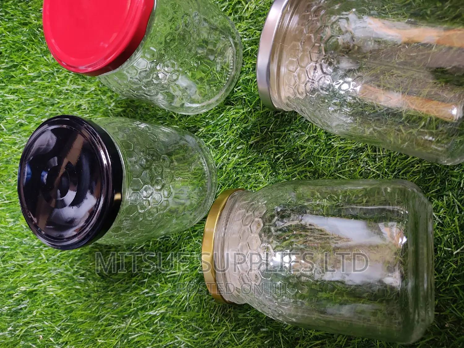 A Set of 40 Glass Jar 740ml With Honey Comb Detail and Lids