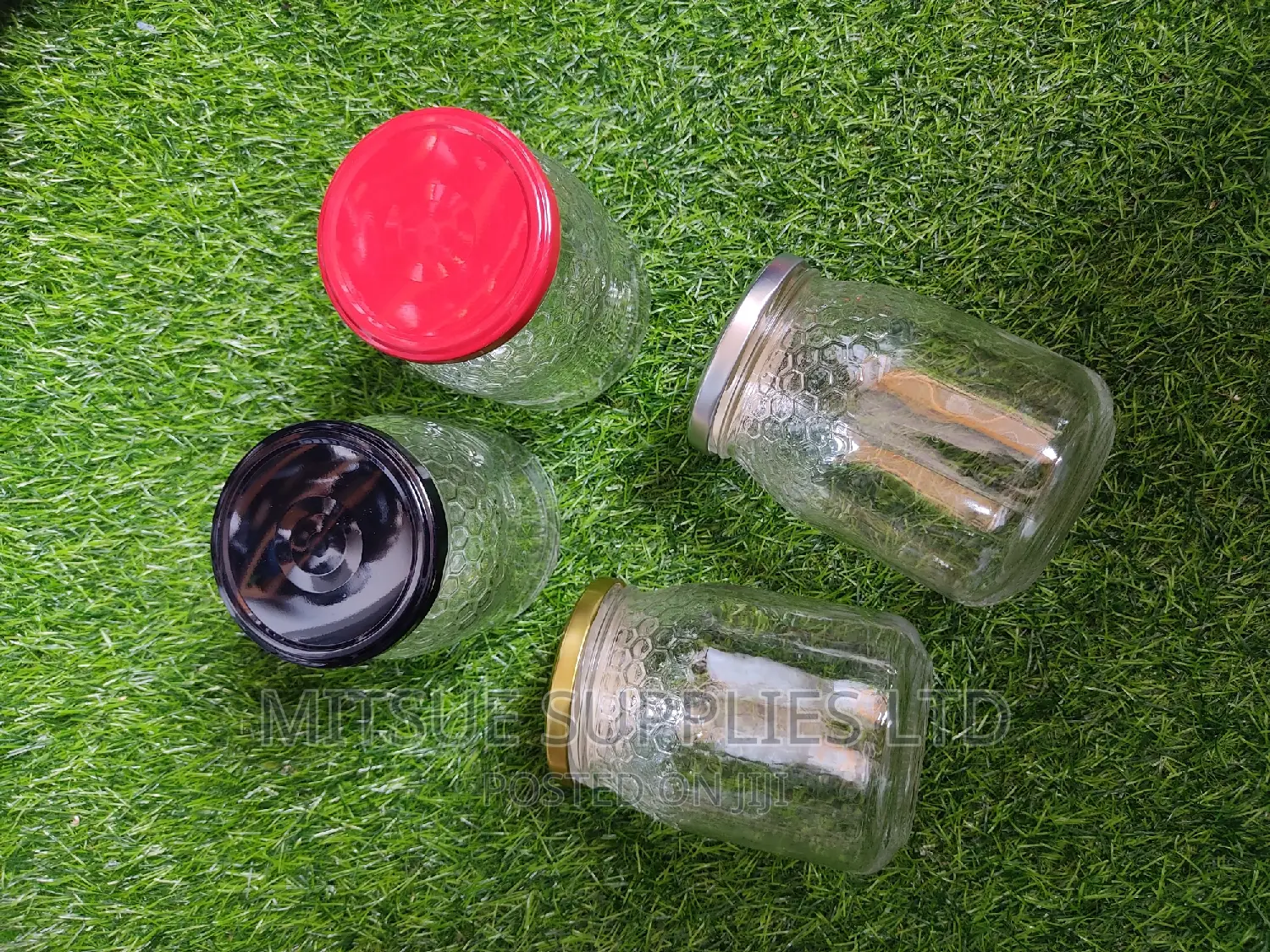 A Set of 40 Glass Jar 740ml With Honey Comb Detail and Lids