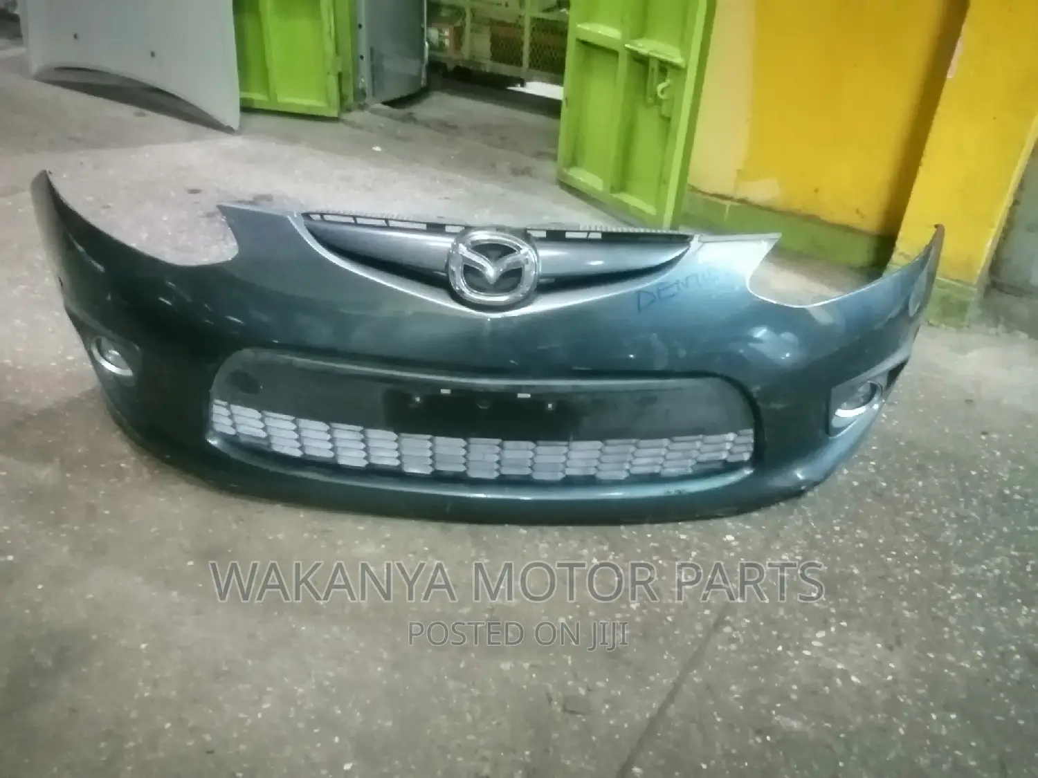 Mazda Demio 2010/2012 Bumper + Fog Lamps, Clean Ex Japan