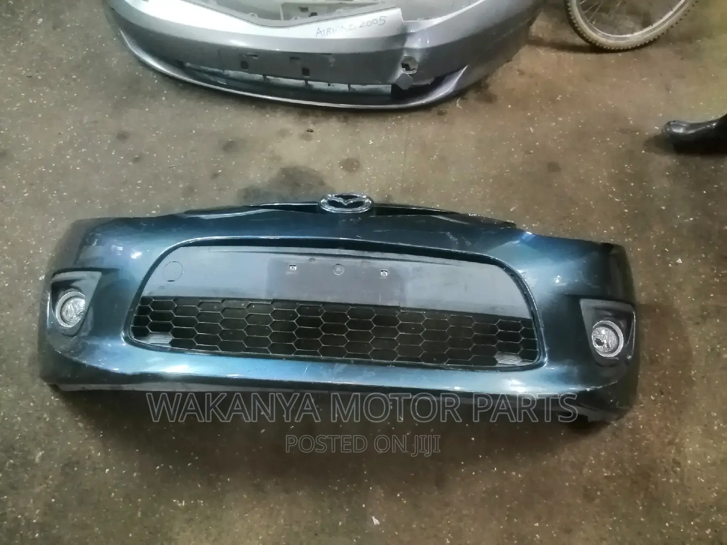 Mazda Demio 2010/2012 Bumper + Fog Lamps, Clean Ex Japan