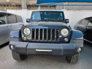 Pre-owned 2016 Jeep Wrangler Sahara 4x4 Blue