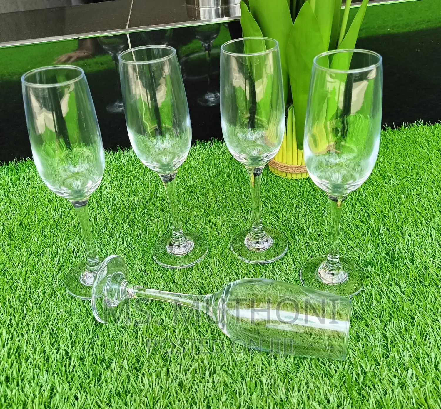 A Set of 6 Clear Champagne Glasses*