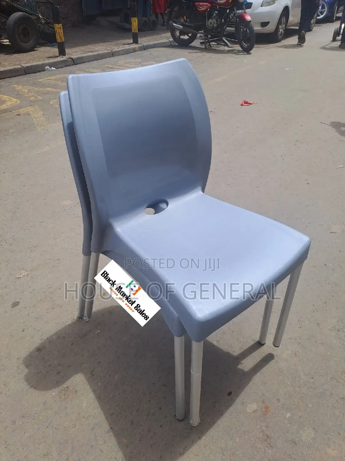 Gray Armless Plastic Chair With Metal Legs