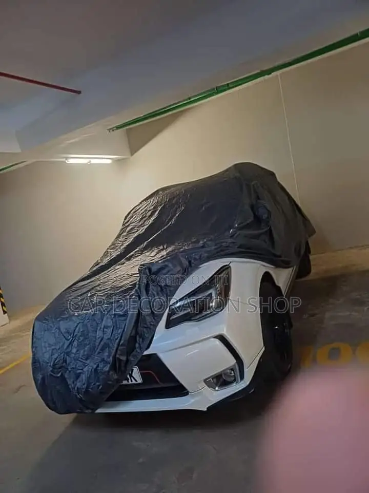 Car Covered With All Weather Car Body Covers