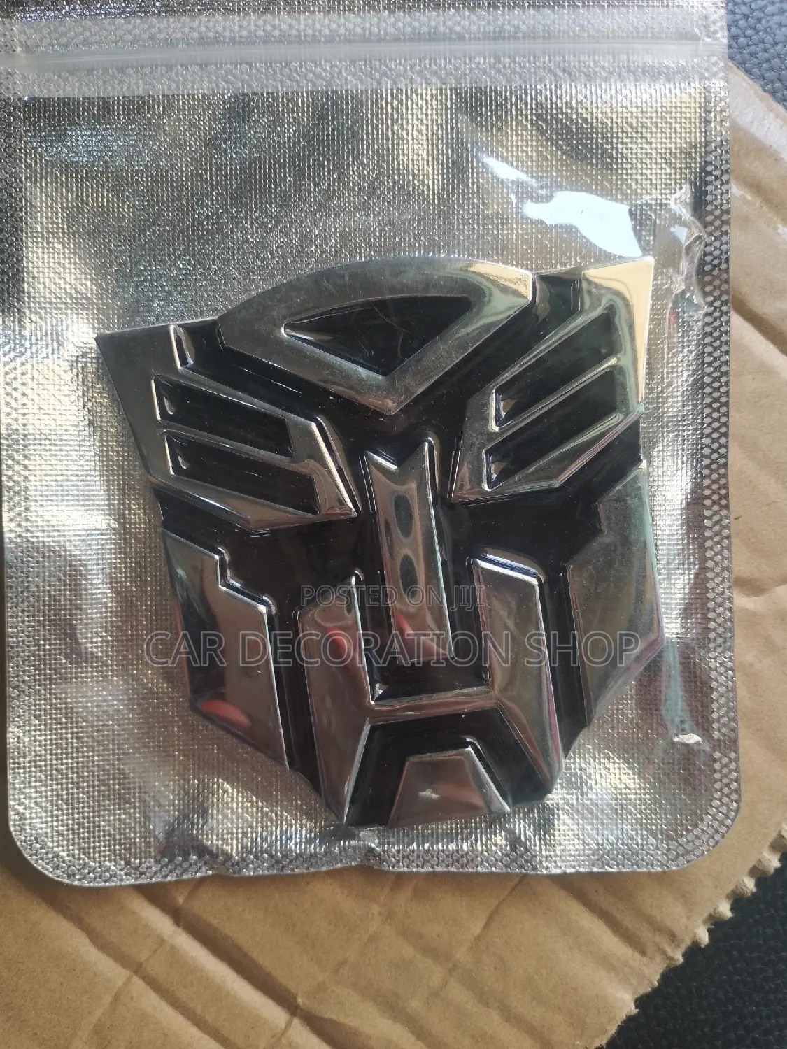Metallic Transformer Logo Badge