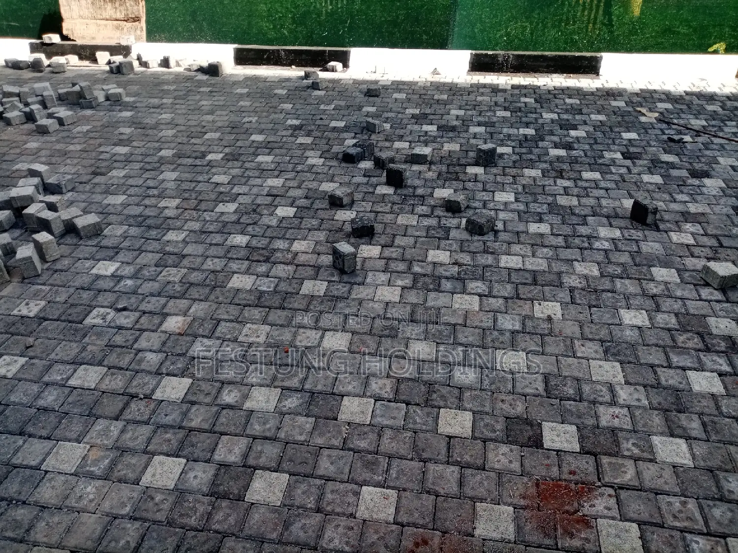Pavers and Cabros Laying