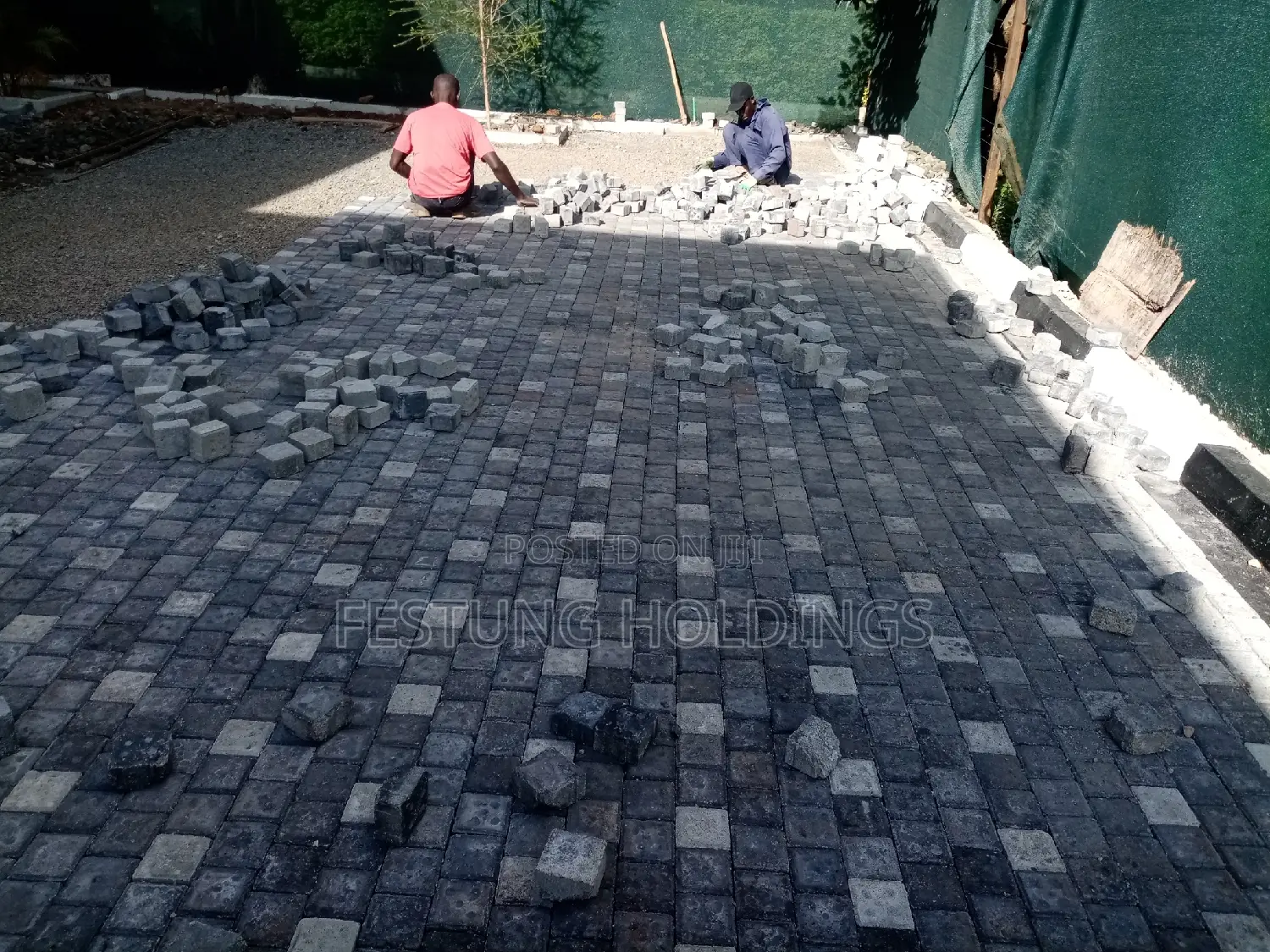 Pavers and Cabros Laying