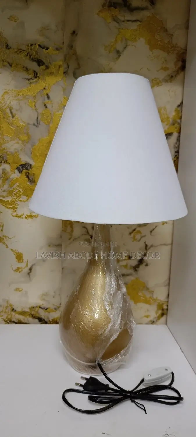 Gold Table Lamp With a Glass Base