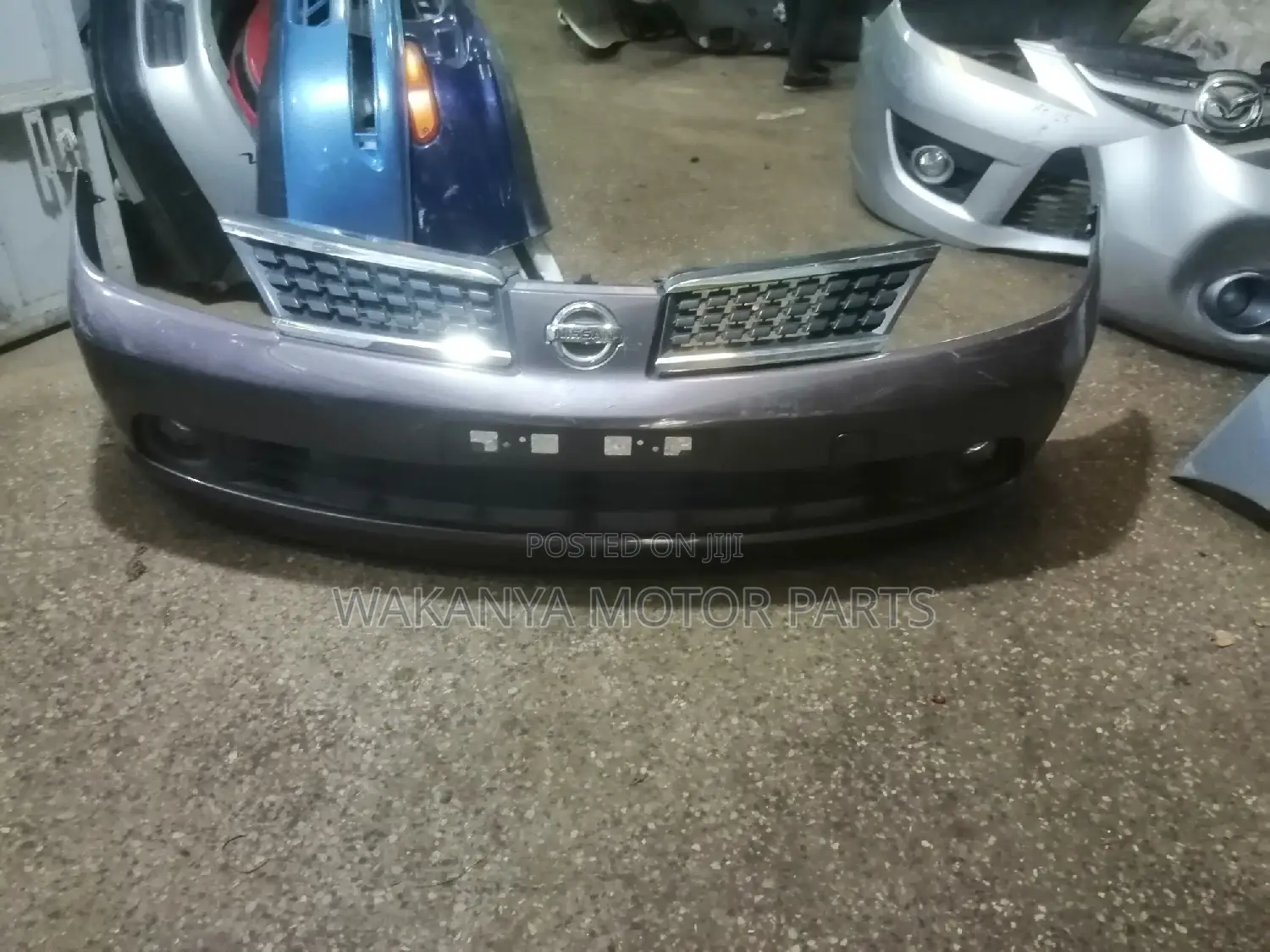 Nissan Tiida 2005/2007 Front Bumper With Fog Lamps but Less Grille