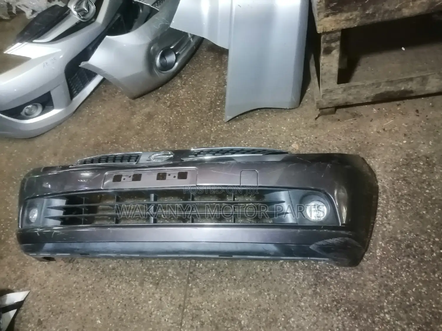Nissan Tiida 2005/2007 Front Bumper With Fog Lamps but Less Grille