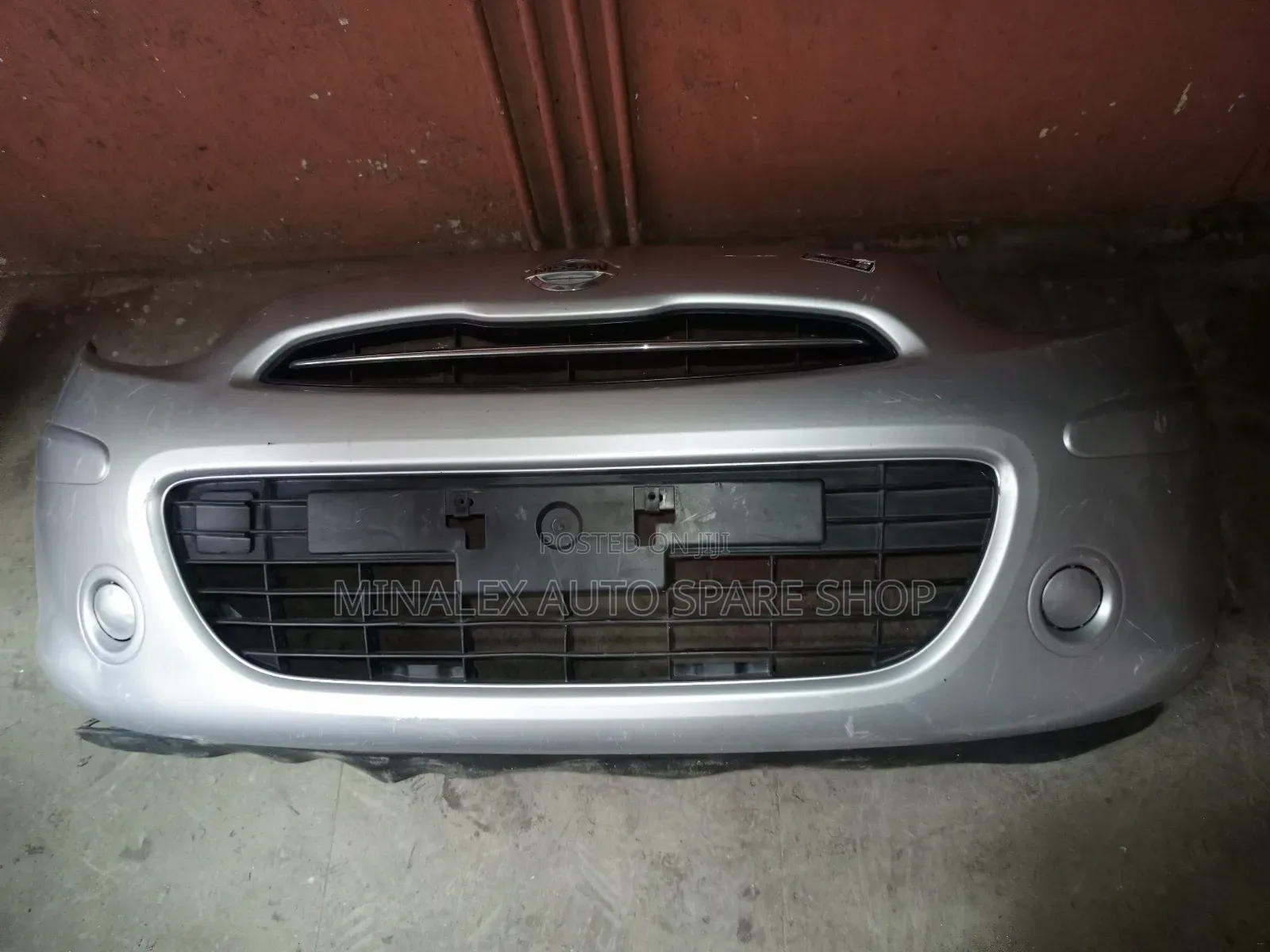 Silver Nissan March Front Bumper