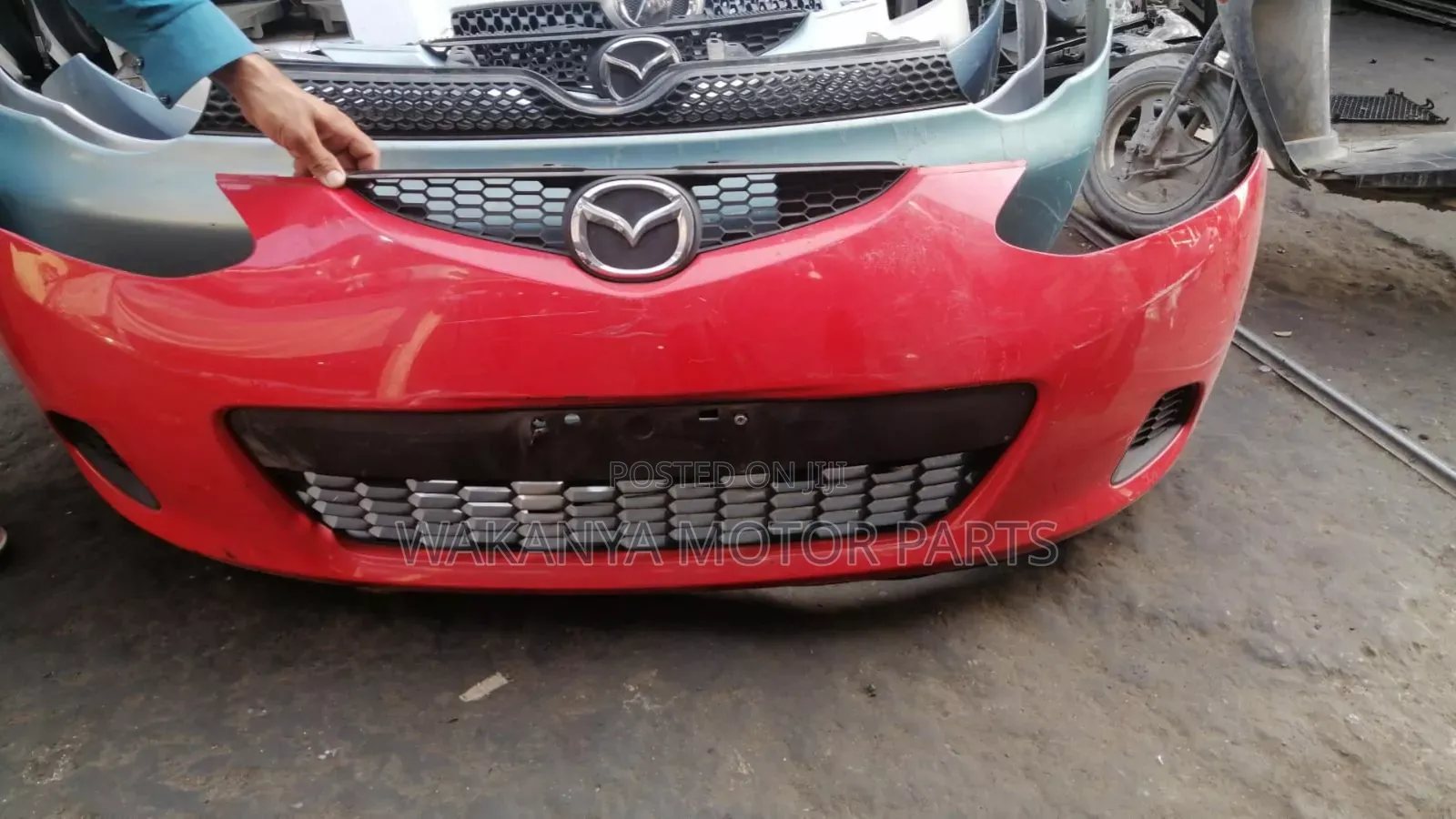 Mazda Demio 2008/2009 Front Bumper Complete, Clean Ex Japan