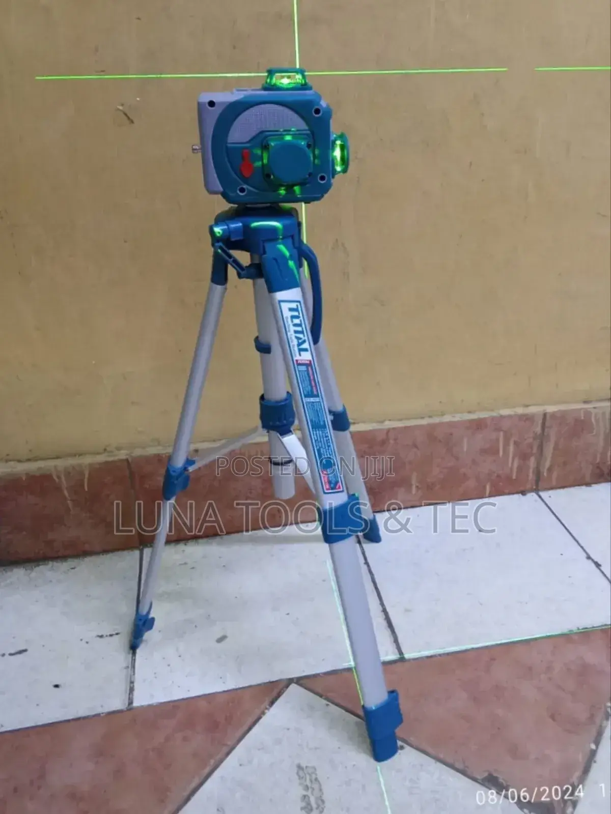 Adjustable Total,Laser Level With Its Stand.
