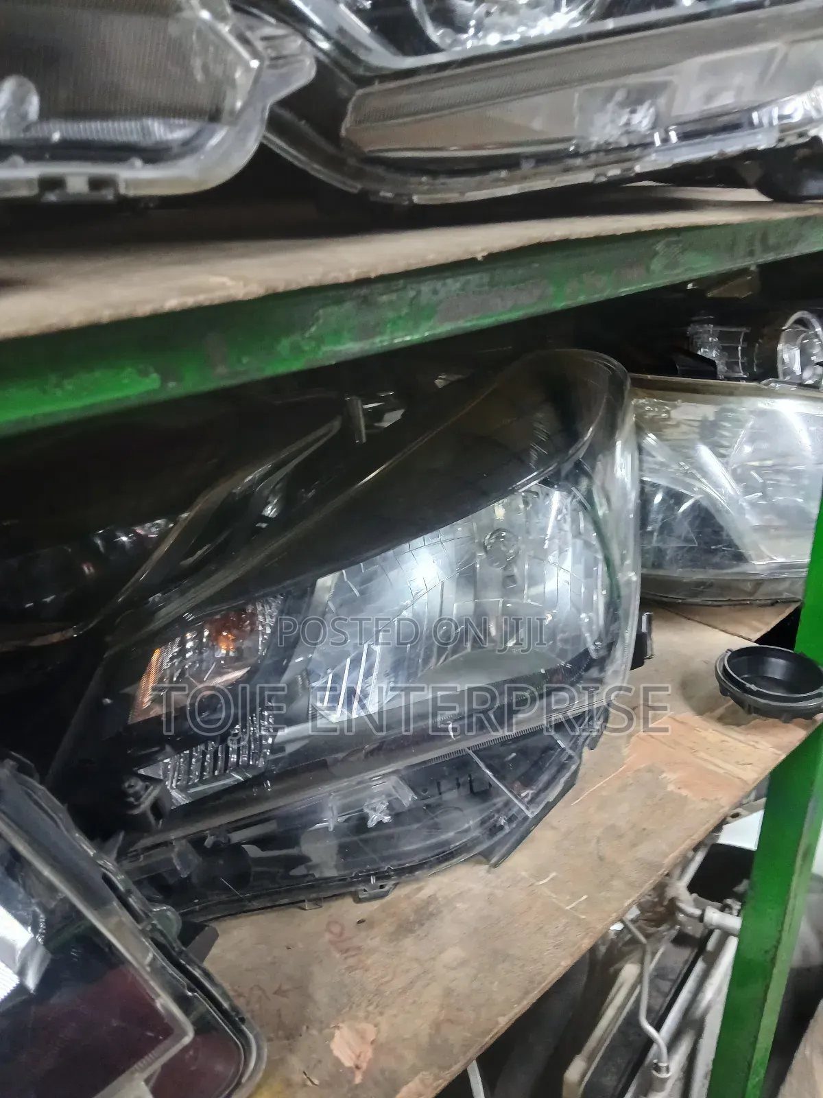 Vitz 2015 Headlight LHS 52-269 Darkshade At