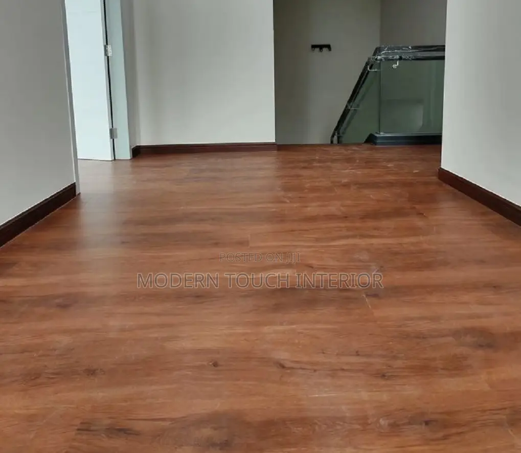 Brown Vinyl Wall to Wall Flooring