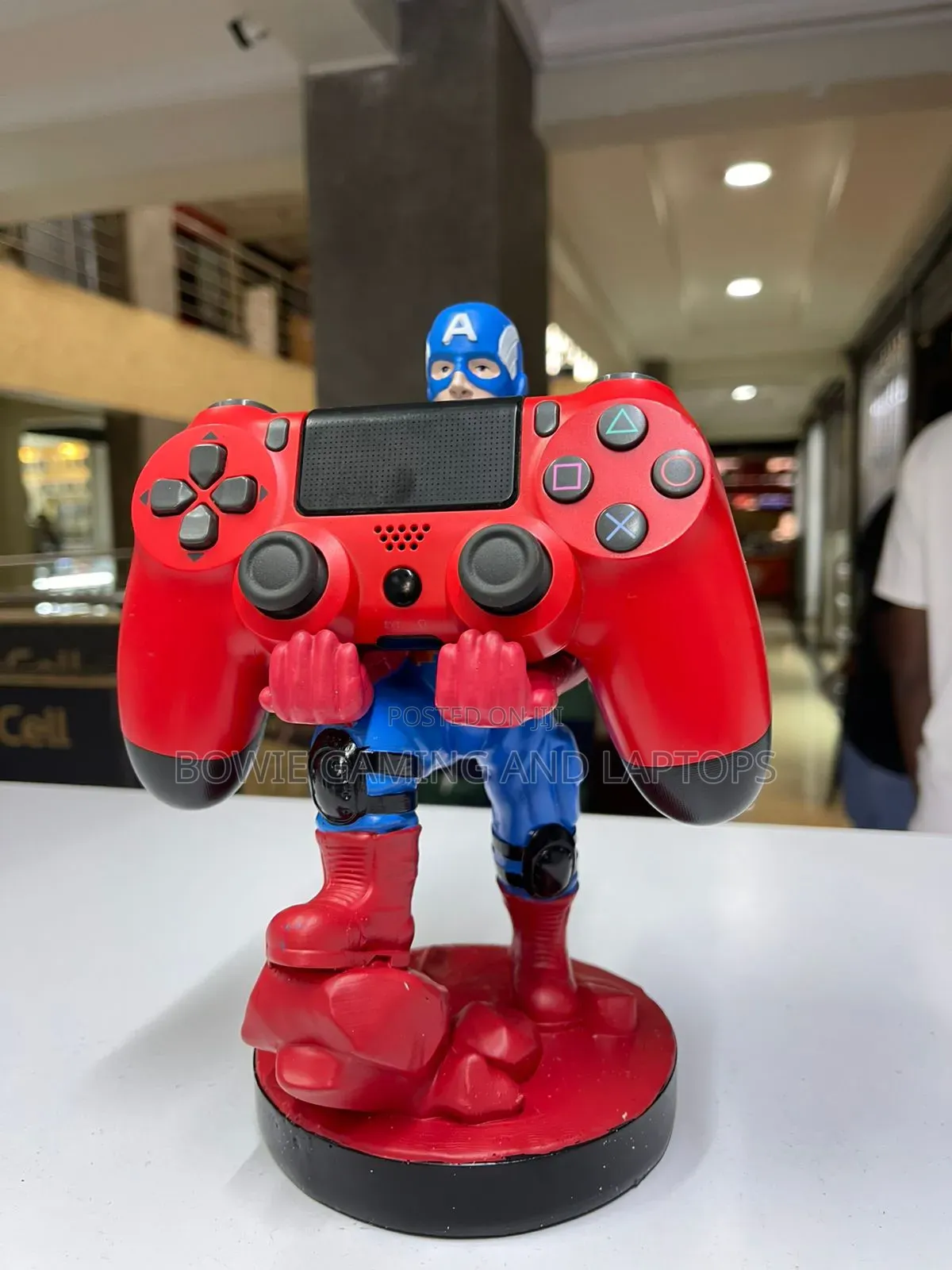 Game Controller Holding Statue Captain America