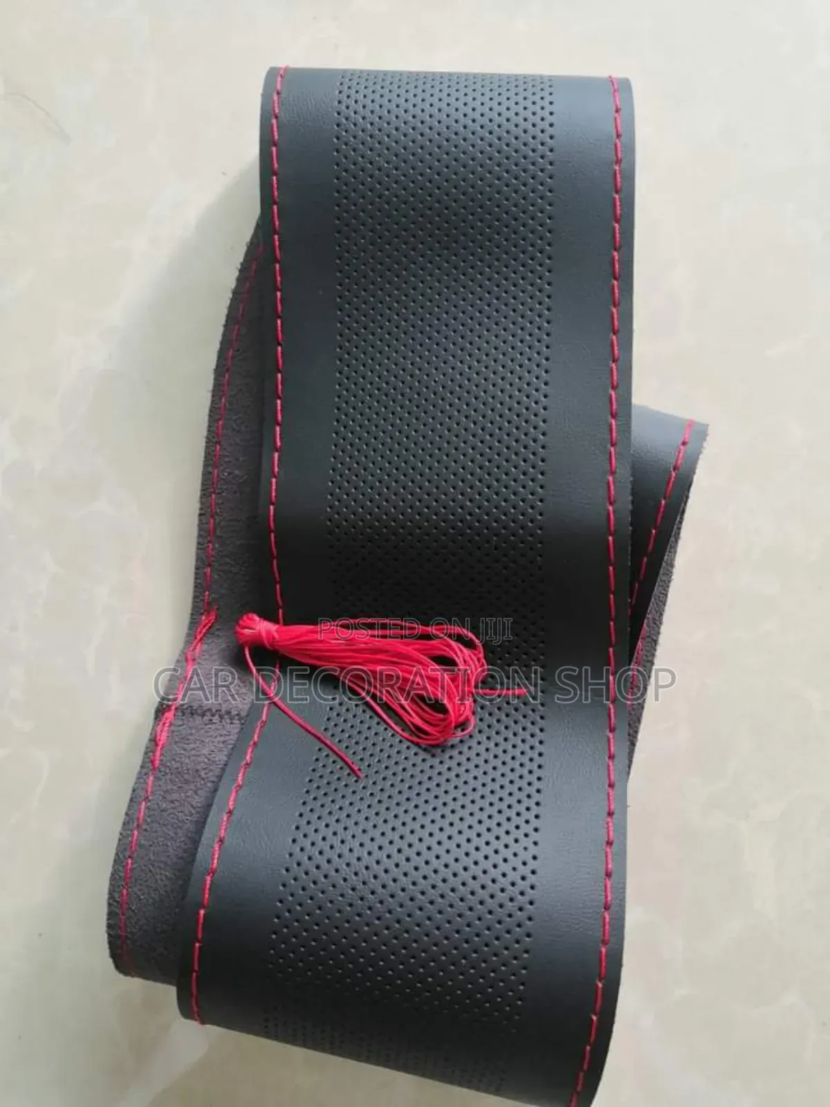 Perforated Leather Steering Cover With Stitching Kneedle