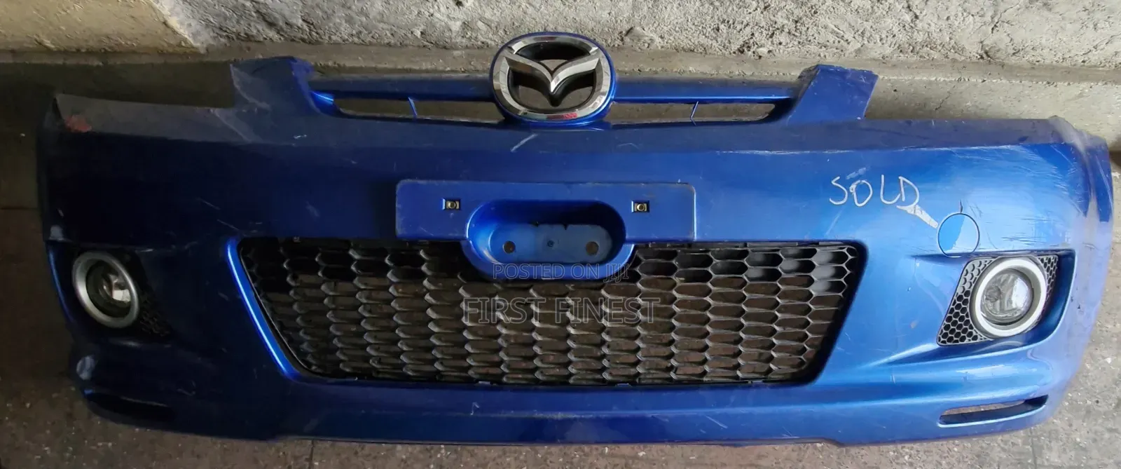Mazda Demio 2005 Bumper With Grill and Fogs