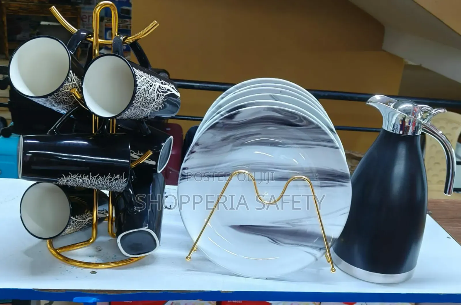 13 Pieces Set of Unique Cups, Plates and a Black Flask