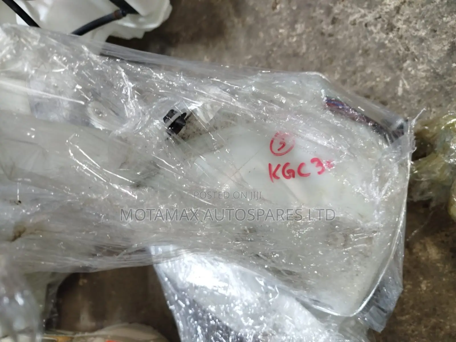 Toyota Passo KGC30 Washer Bottle