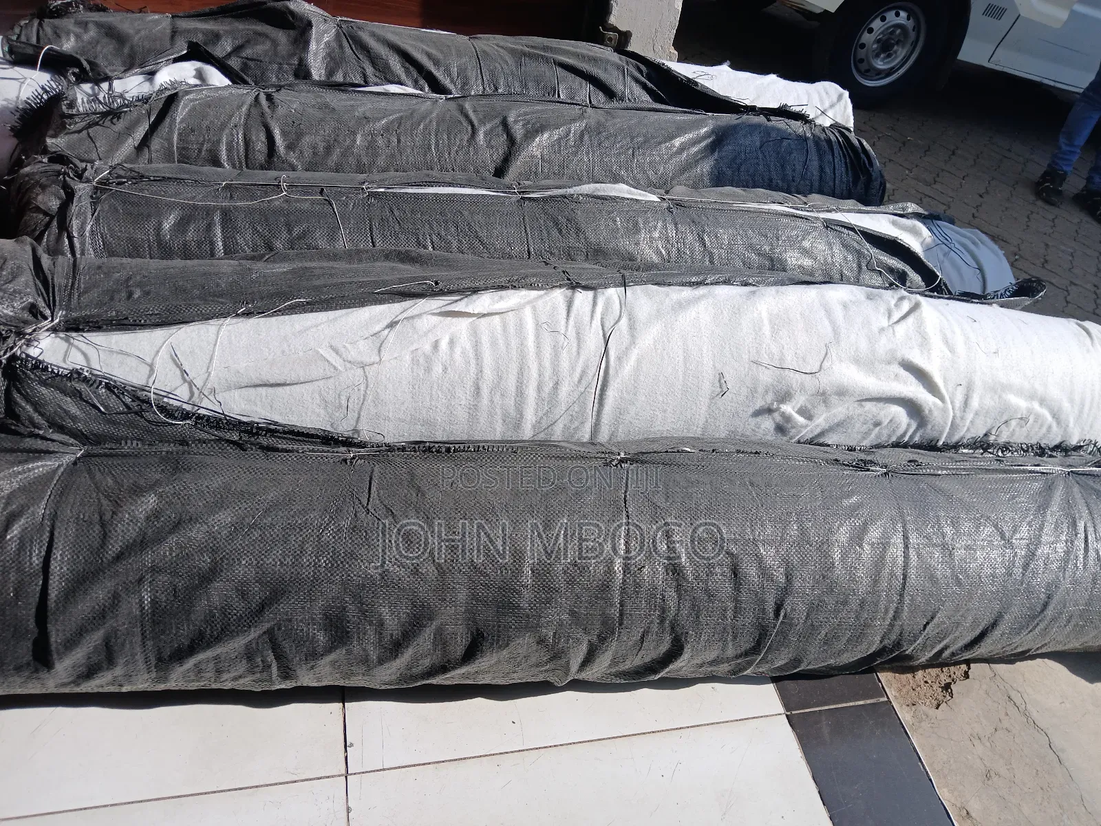 (2m by 50m ) Geotextile Membrane .