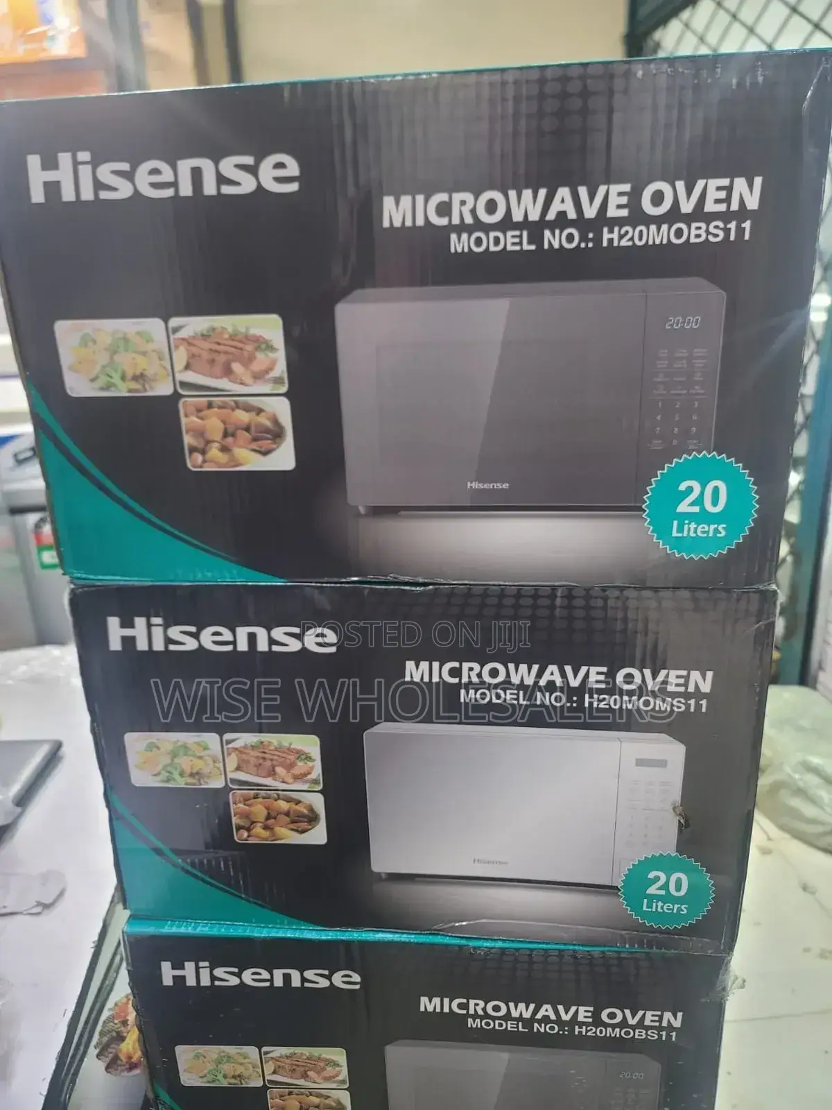 Silver And Black Hisense Digital Microwave At