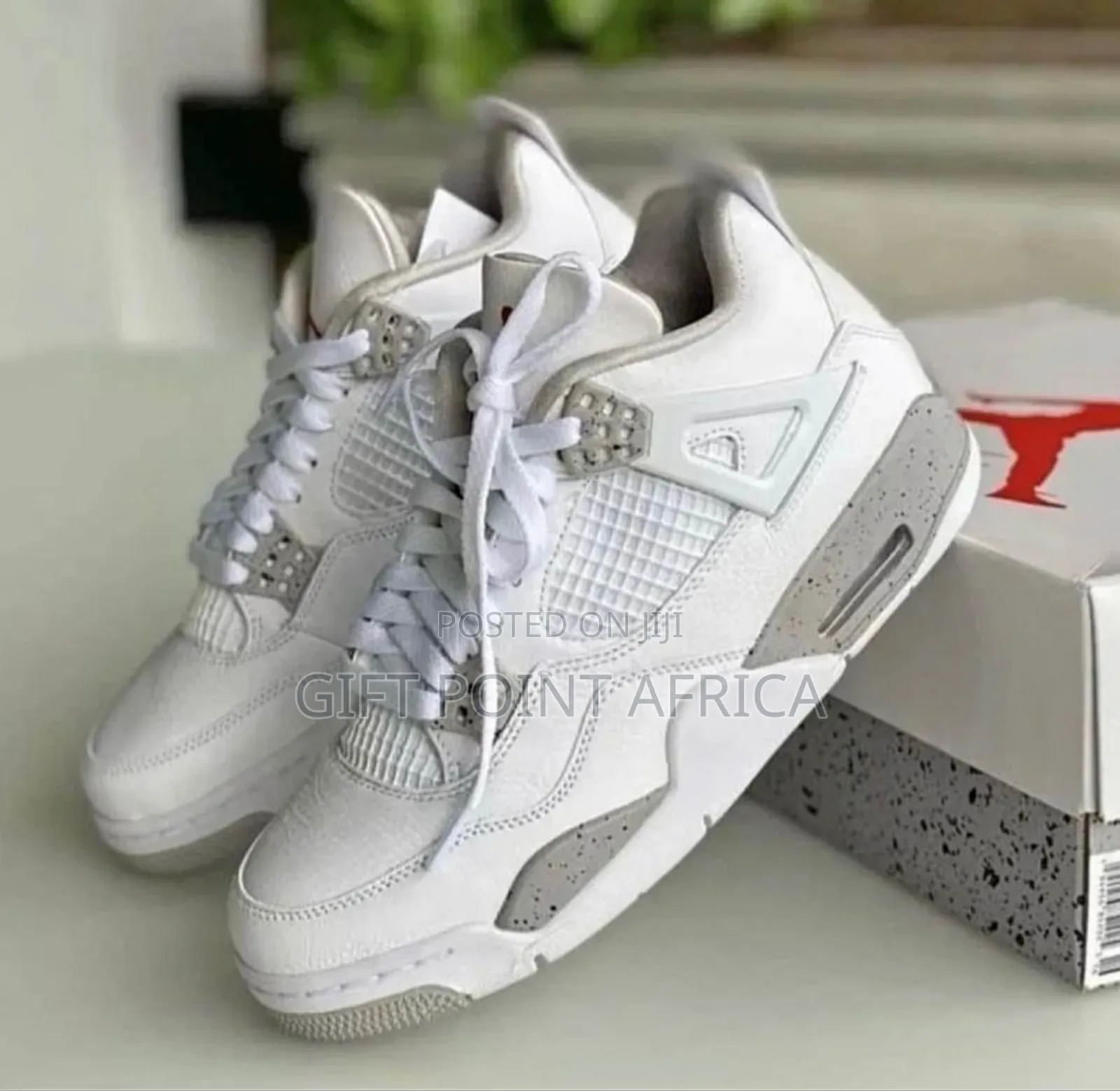 Air Jordan 4 Leather Retro Oreo Sneakers