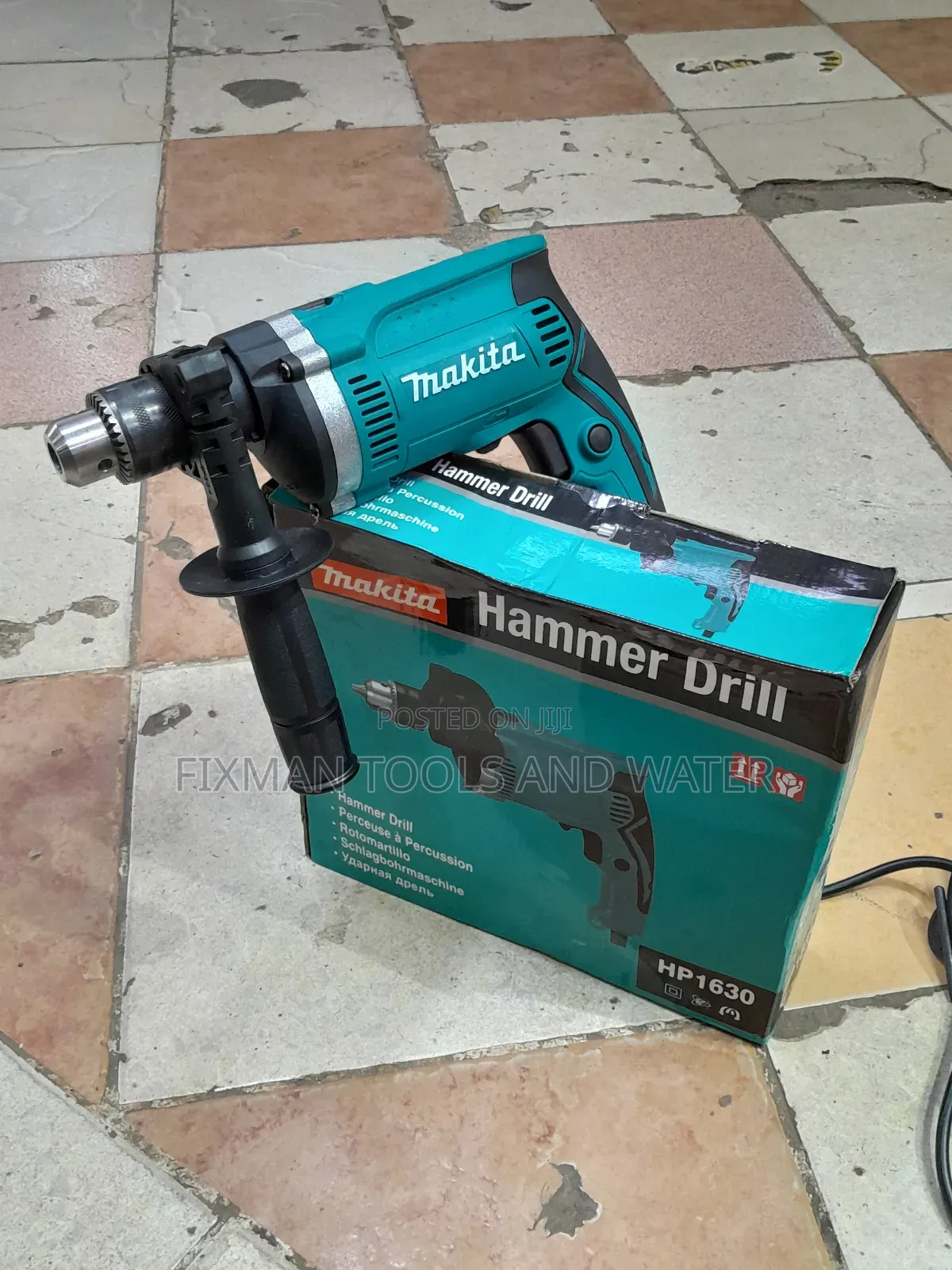 Makita Impact Drill 710W + FREE BITS