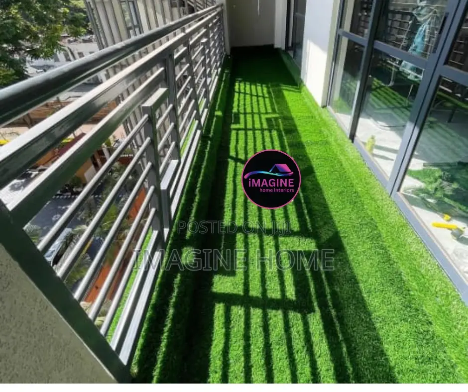 Glass Balcony With Green Grass Carpet