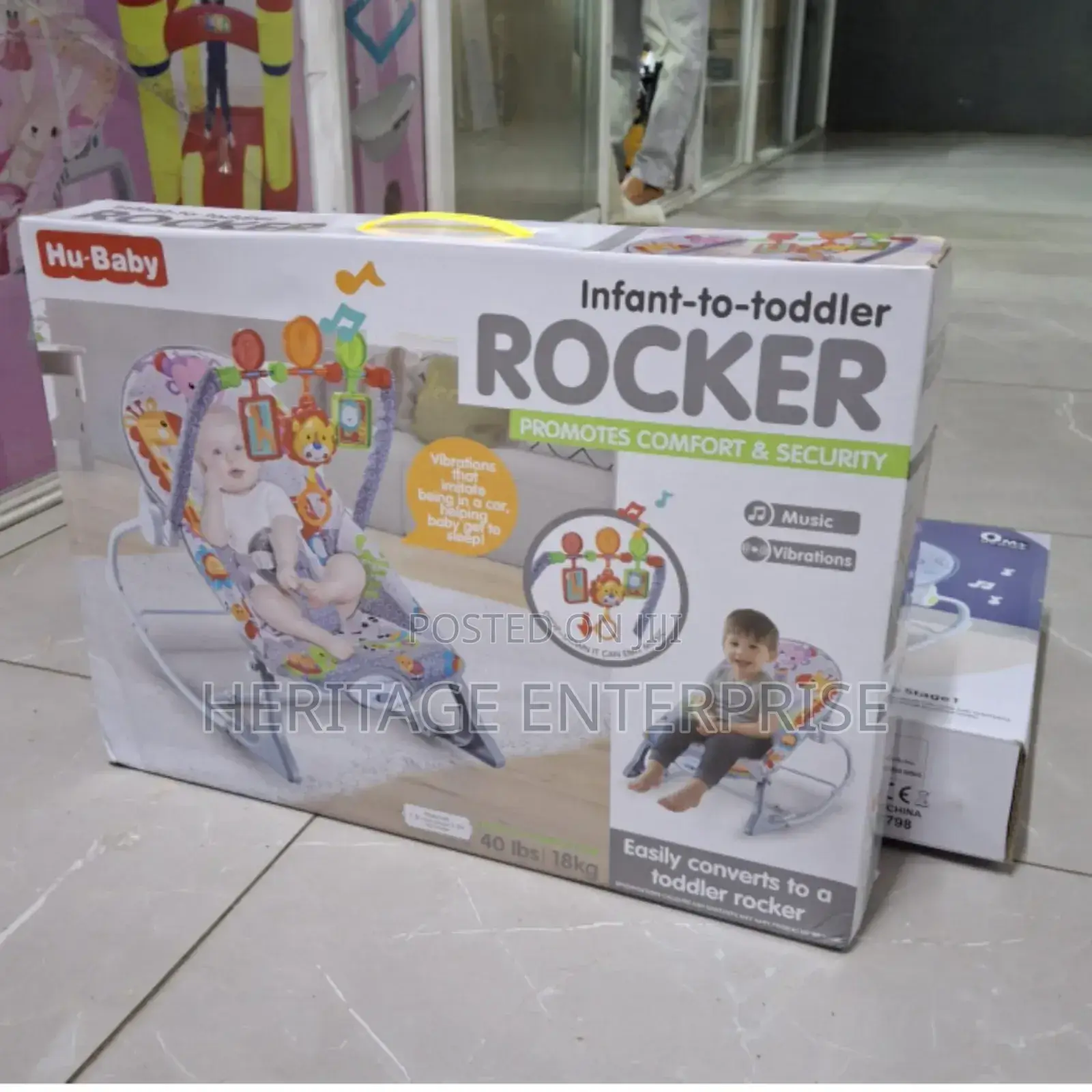 Baby Rocker Infant to Toddler With Musical Toy Bar