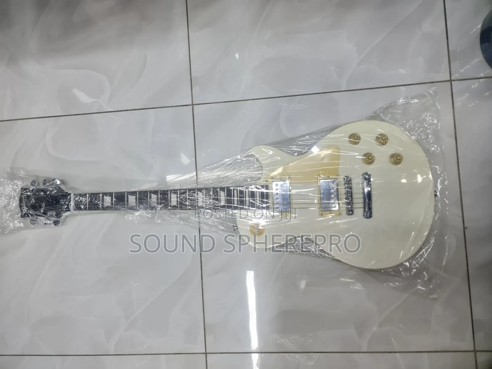 White Les Paul Guitar