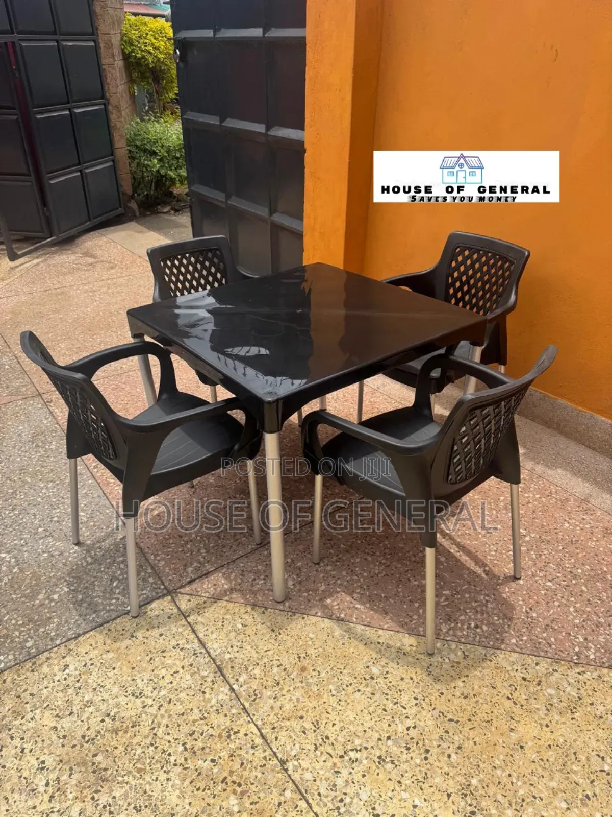 1 Table and 4 Chairs With Metal Legs All in Black Colour