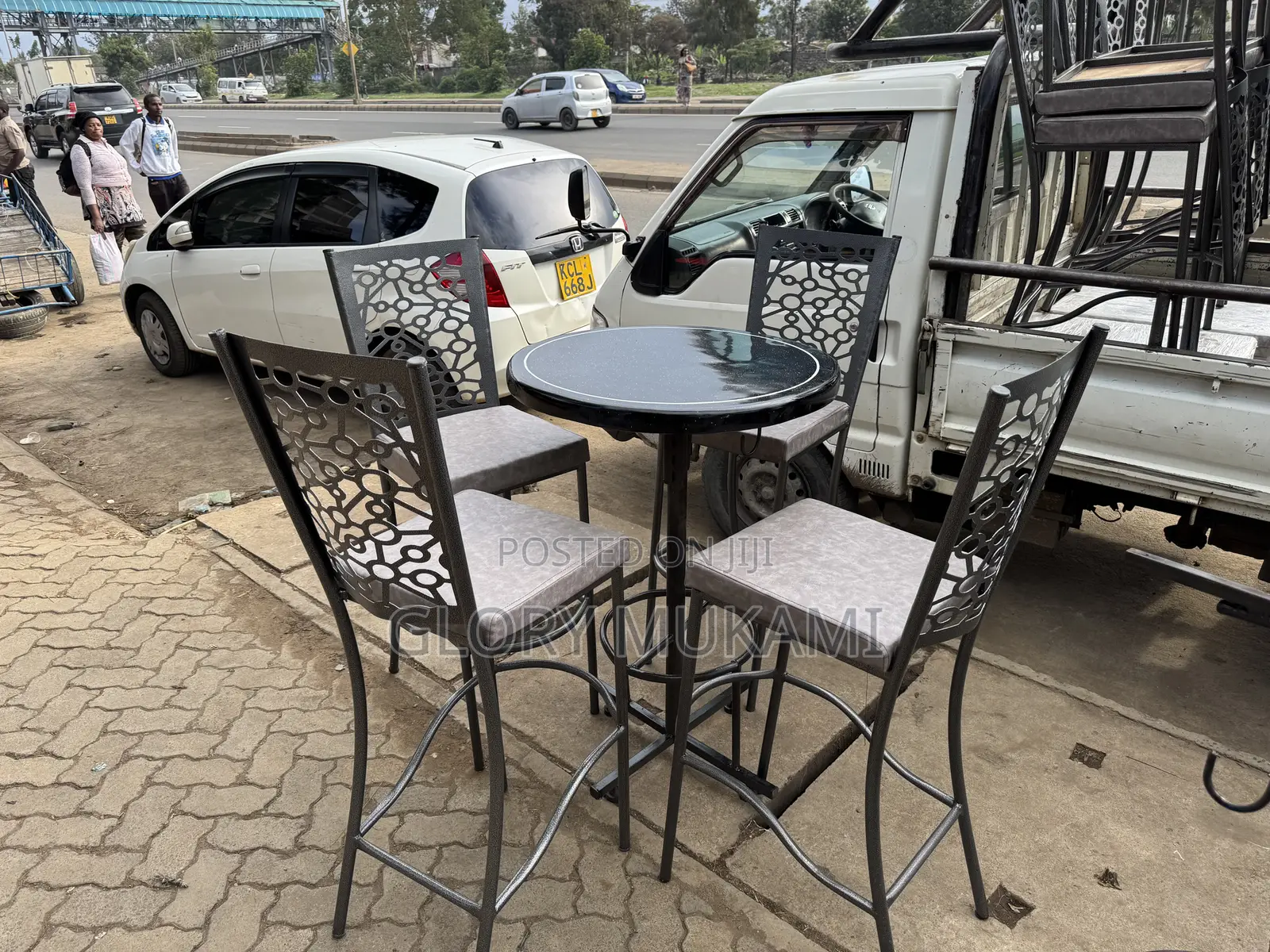 Restaurant And Bar High Mabati Chairs And Round Black Table