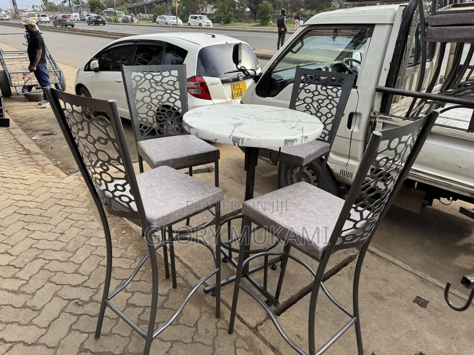 White High Round Table And High Bar Chairs