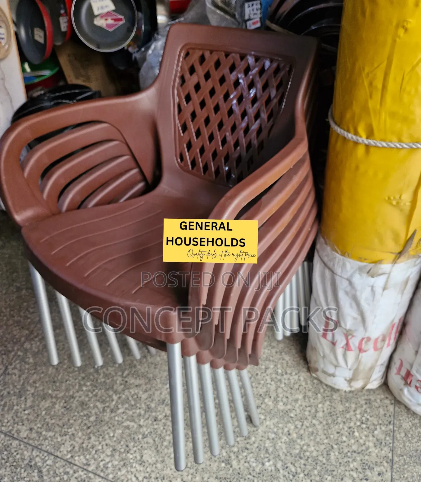 Brown Plastic Chair With Metallic Stands.