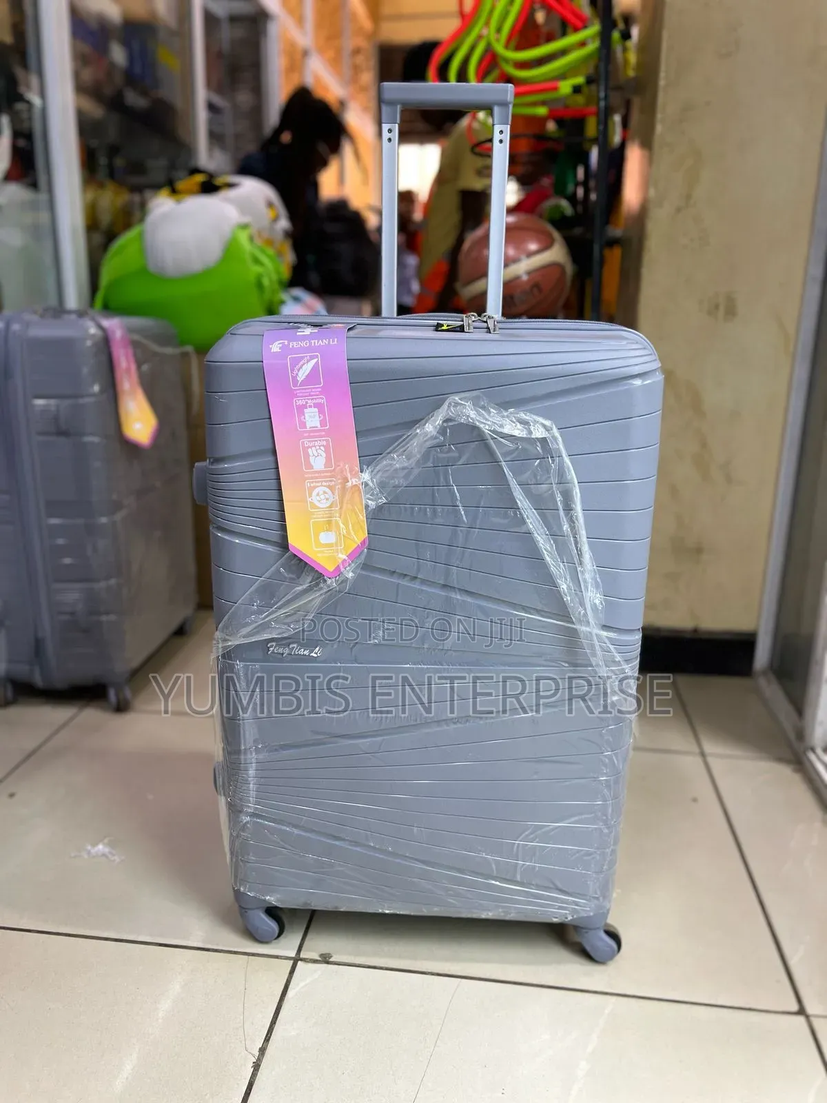 Light Grey  1 Large Size Quality Rubber Suitcase at 4500