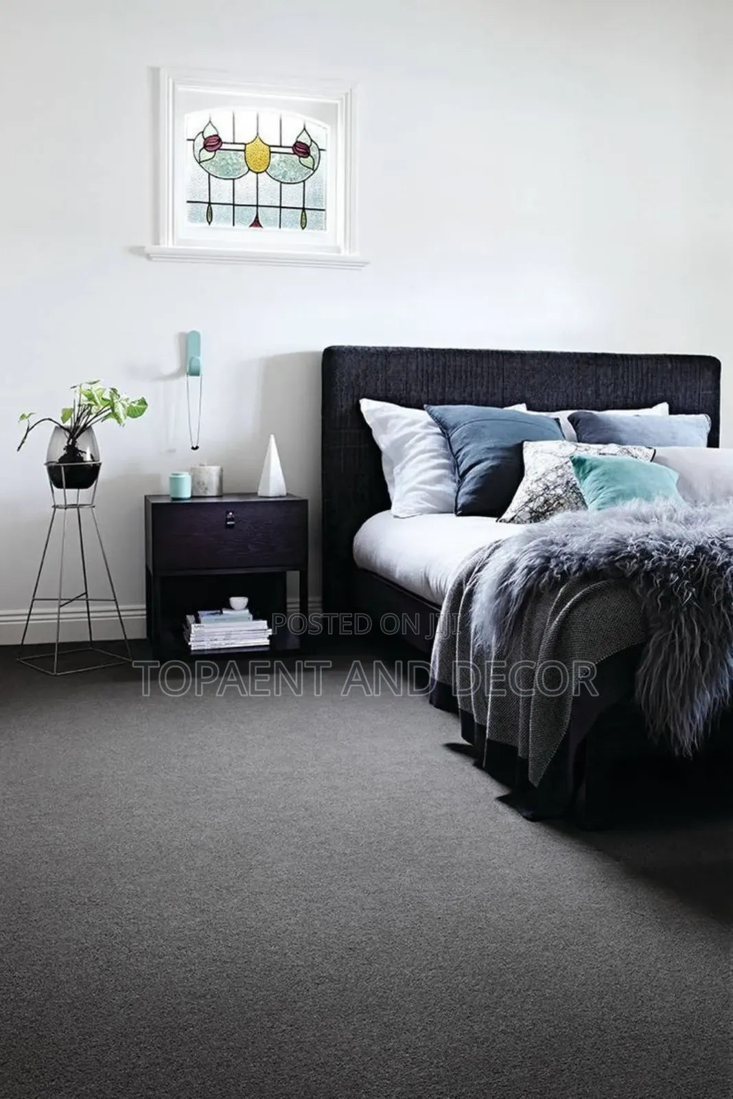 Simple Bedroom With Wall to Wall Carpet