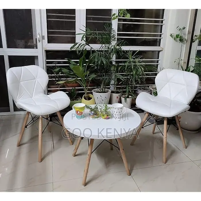 Home Chairs ; Four Leather White Eames Dining Chair