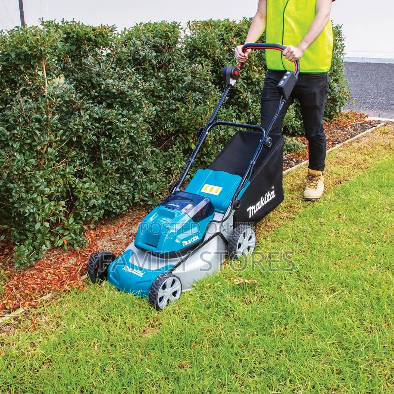 Makita Brand Petrol Lawn Mowing Machine With Bag.