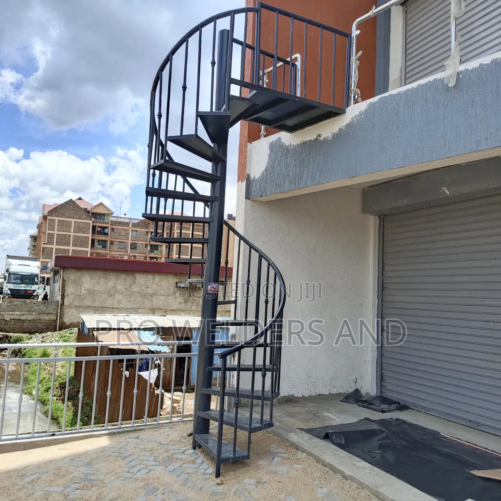 "Climb With Confidence – Modern Steel Spiral Stairs"